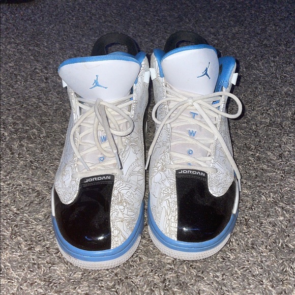 Jordan Sneakers with White, Black, and Blue Highlights - Picture 1 of 4